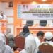 Wakil Bupati Boalemo, Lahmudin Hambali saat membuka Advokasi dan Koordinasi Penyelenggaraan Laboratorium Kesehatan Masyarakat yang digelar di Hotel Grand Amalia, Rabu (08/10/2025).