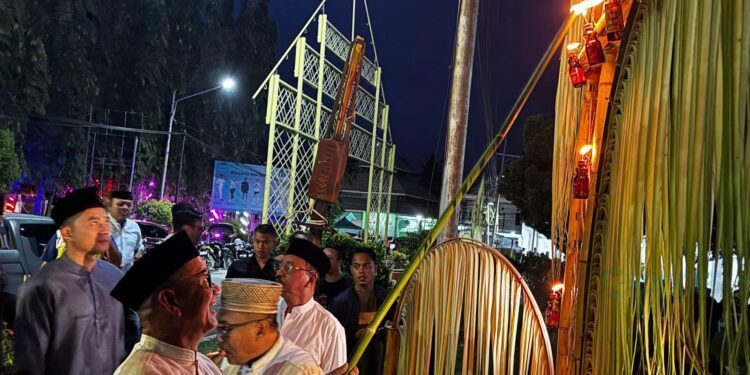 Anggota DPD RI, Syarif Mbuinga, menghadiri malam pasang lampu di Kabupaten Boalemo, Senin (16/03/2026) (Istimewa)