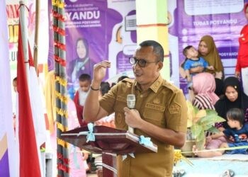 Wakil Bupati Boalemo, Lahmuddin Hambali, memberikan sambutan Launcing Posyandu (Prokopim Boalemo)