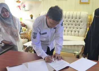 Penandatanganan nota kesepahaman (MoU) dengan Dinas Pemberdayaan Perempuan dan Perlindungan Anak (P3A) Kabupaten Gorontalo Utara. (foto.istimewa)