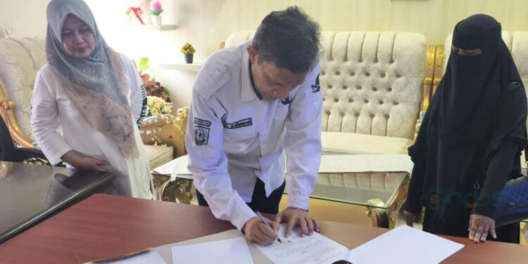 Penandatanganan nota kesepahaman (MoU) dengan Dinas Pemberdayaan Perempuan dan Perlindungan Anak (P3A) Kabupaten Gorontalo Utara. (foto.istimewa)