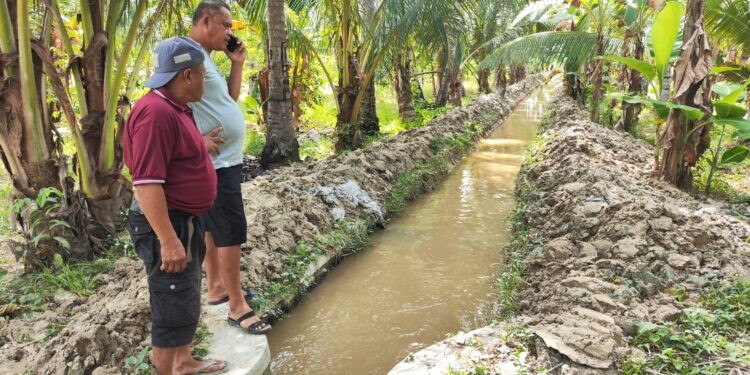 Saluran air irigasi di Paguat mulai lancar usai pengangkatan sedimen, Sabtu (09/05/2026) (Istimewa)