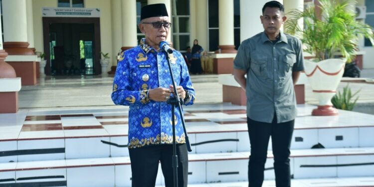 Wakil Bupati Pohuwato, Iwan Adam, memberikan sambutan apel Korpri, (Prokopim Pohuwato)