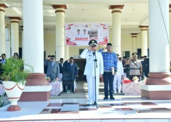 Bupati Pohuwato, Saipul Mbuinga, memimpkn upacara peringatan Hari Otonomi Daerah (Otda) ke-XXX Tahun 2026, (Prokopim Pohuwato)