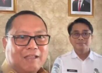 Bupati Gorontalo Utara Thariq Modanggu bersama Kepala Stasiun Geofisika Andri Wijaya Bidang.(F. Istimewa)