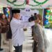 Sekretaris Daerah Bone Bolango, Iwan Mustapa saat menghadiri penamatan dan perpisahan siswa kelas IX SMP Negeri 1 Tapa, Rabu (10/6/2026). (Foto Istimewa)