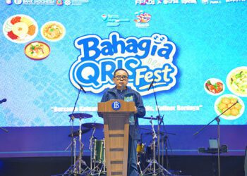 Kepala Perwakilan BI Gorontalo, Bambang Satya Permana, saat peluncuran layanan QRIS Tap pada merchant kuliner, Sabtu (18/7/2026) di GOR David Toni, Limboto. (Humas BI Gorontalo)