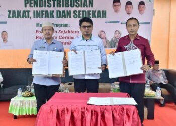 Nota kesepakatan kerja sama Pemkab dan Baznas Pohuwato terkait penanggulangan bencana, (Prokopim Pohuwato)