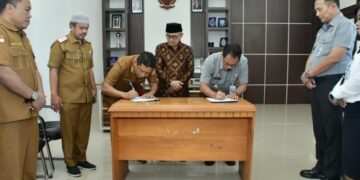 Pemkab Pohuwato bersama Kemenkum menandatangani kerjasama dalam hal perlindungan Kekayaan Intelektual.