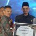 Kepala Bakasbangpol Jember Lingga Diputra saat mewakili bupati Jember Muhammad fawait di acara Rajar Jember Award 2026.