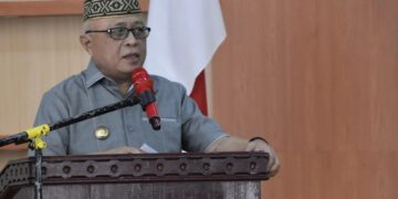 Sosialisasi Pengisian Administrasi dan Data Kelompok PKK Desa dan Kecamatan, Sosialisasi Hasil Rakernas PKK, serta Penguatan Bupati Gorontalo Sofyan Puhi memberikan sambutan pada Program Kerja Pokja-Pokja PKK Kabupaten Gorontalo, Senin (24/8/2026).