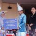 Sekda Boltara saat menyerahkan SK Pensiun sekaligus THT (Dok: Istimewa)