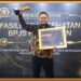 Kepala Puskesmas Umbulsari, dr. Nur Ahmad Santoso saat menerima penghargaan