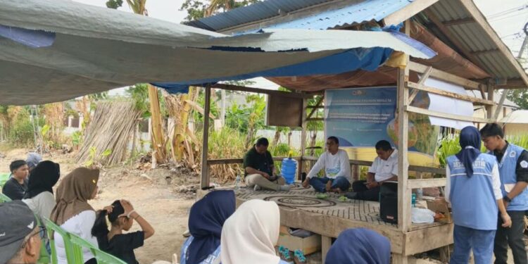 Mahasiswa Kuliah Kerja Nyata (KKN) Tematik Tahap II Universitas Negeri Gorontalo (UNG) Tahun 2026 melaksanakan Sekolah Lapang Budidaya Sorgum Adaptif Iklim di Dusun Sakulati, Desa Tolotio, Kecamatan Tibawa, Kabupaten Gorontalo, Sabtu (5/9/2026). (F.Istimewa)