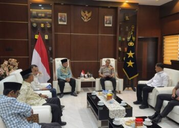 Pertemuan Kapolda Gorontalo Irjen Pol Nurworo Danang bersama Ketua PWNU Gorontalo Ibrahim T Sore terkait rencana Polda Gorontalo menjadi tuan rumah Hari Santri Nasional 2026.